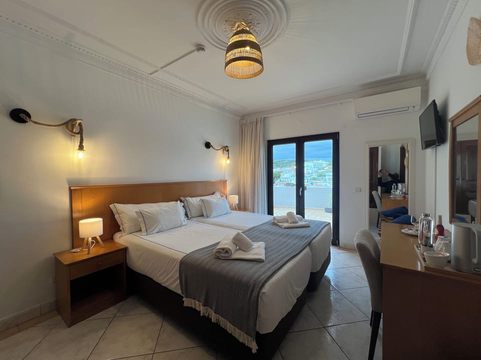 Classic Double Room, Balcony | Memory foam beds, in-room safe, desk, iron/ironing board