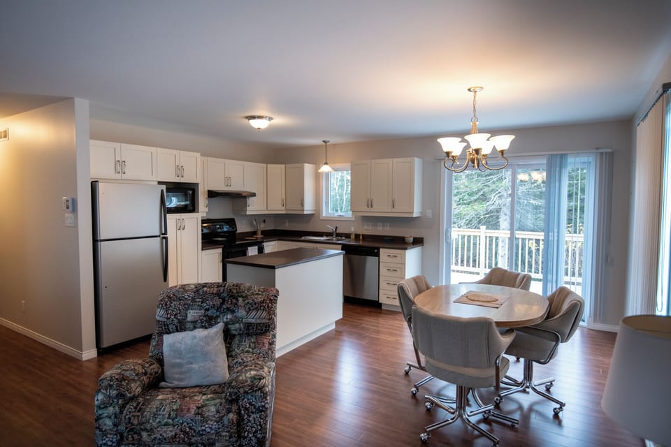 Townhome | Private kitchen | Fridge, coffee/tea maker