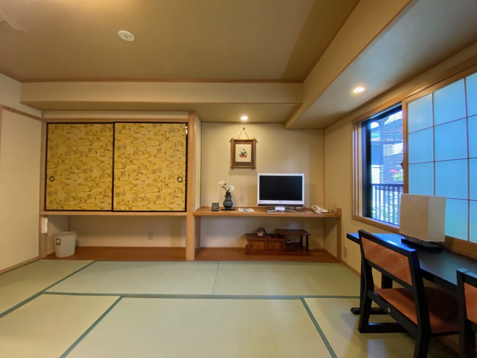 Standard Twin Room | In-room safe, individually decorated, desk, iron/ironing board