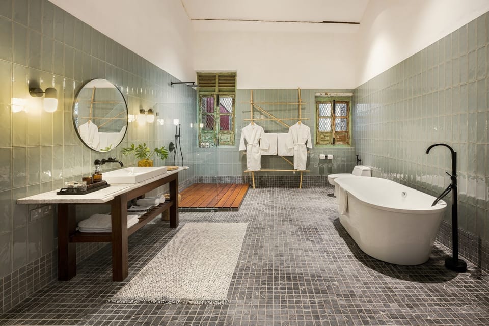 Townhome, 1 King Bed with Sofa bed, City View (Not On Site) | Bathroom | Separate tub and shower, rainfall showerhead, free toiletries