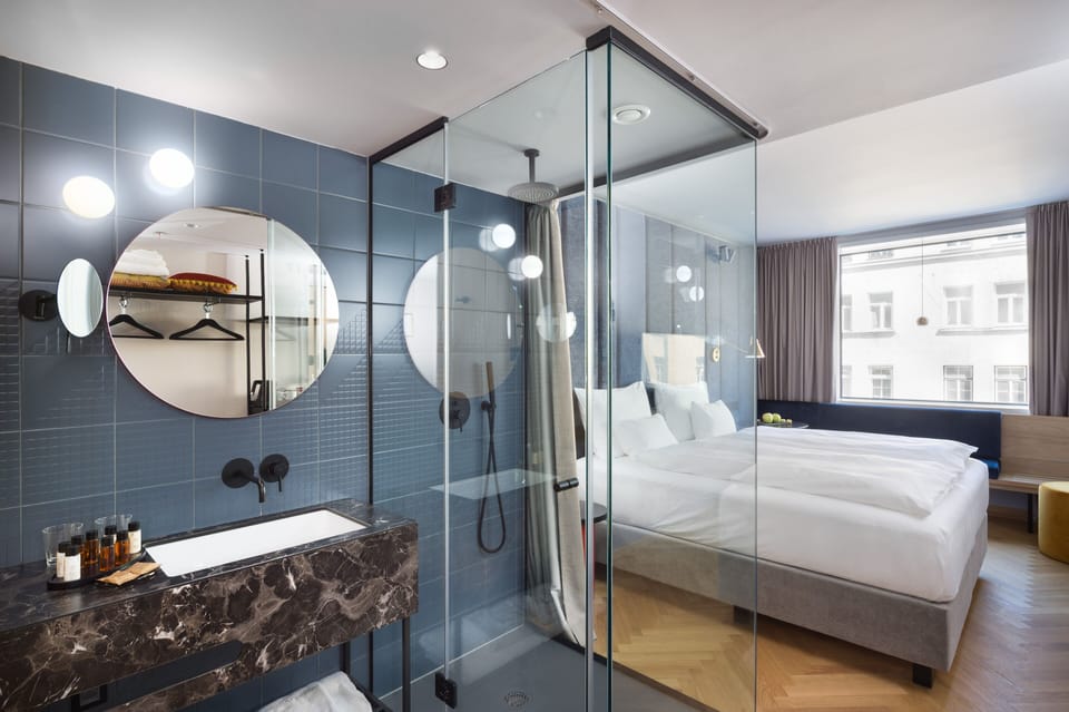 Combined shower/tub, eco-friendly toiletries, slippers, towels