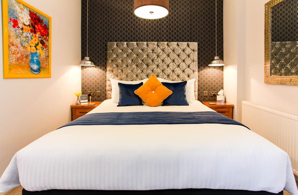 Desk, blackout drapes, iron/ironing board, free WiFi