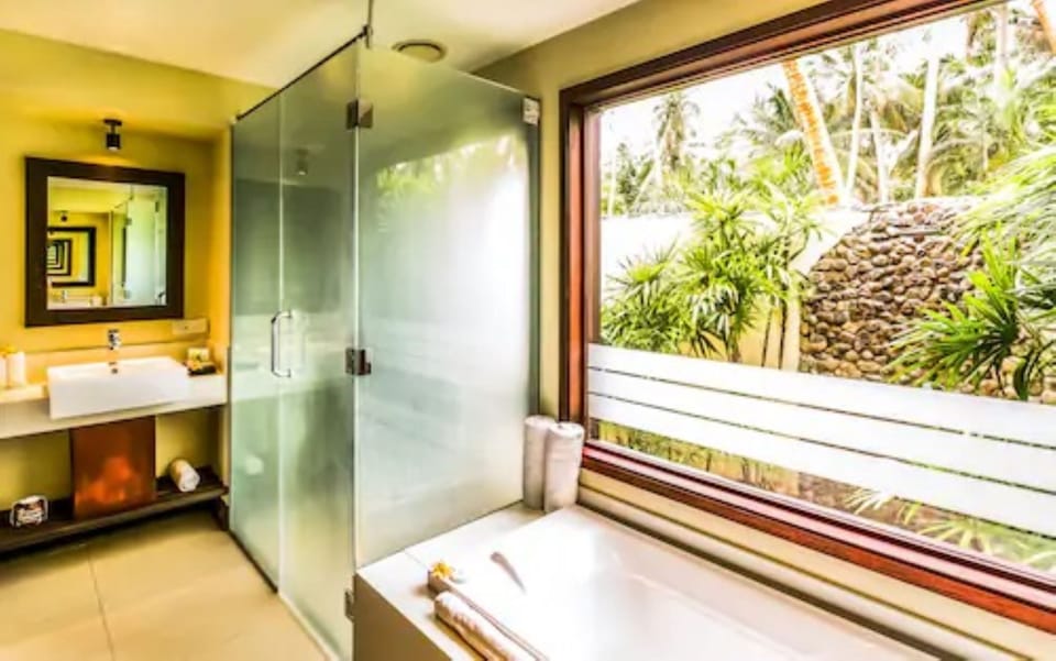 Beachfront Plunge Pool Bure | Bathroom | Shower, free toiletries, towels