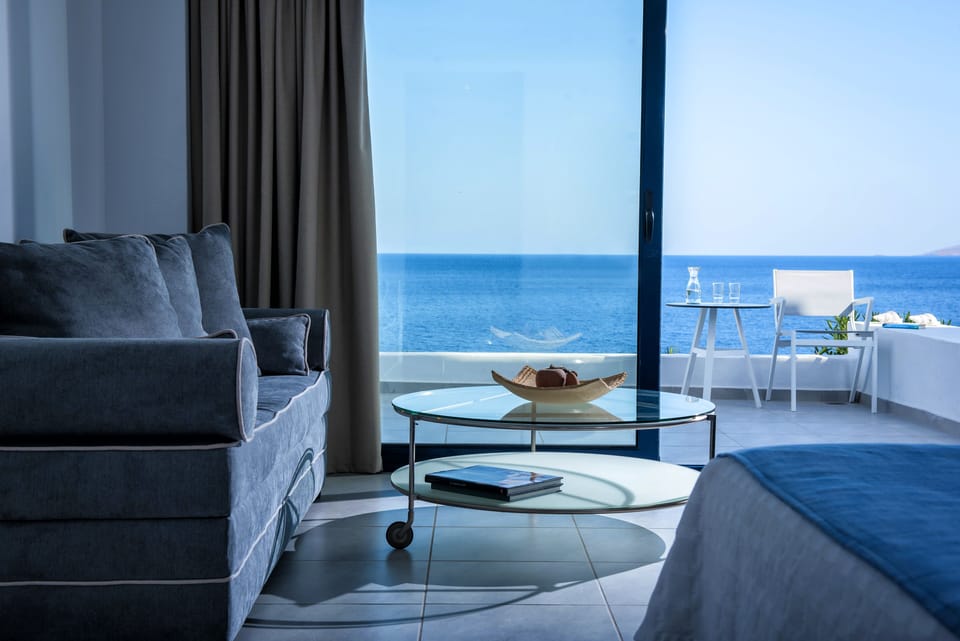 Junior Suite, Sea View | Premium bedding, in-room safe, individually decorated