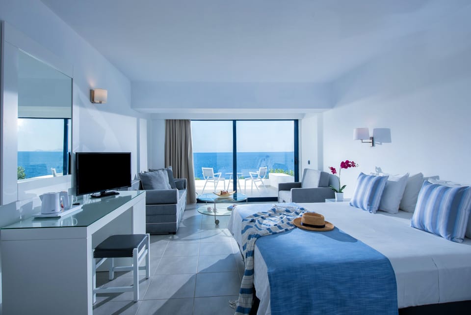 Junior Suite, Sea View | Premium bedding, in-room safe, individually decorated