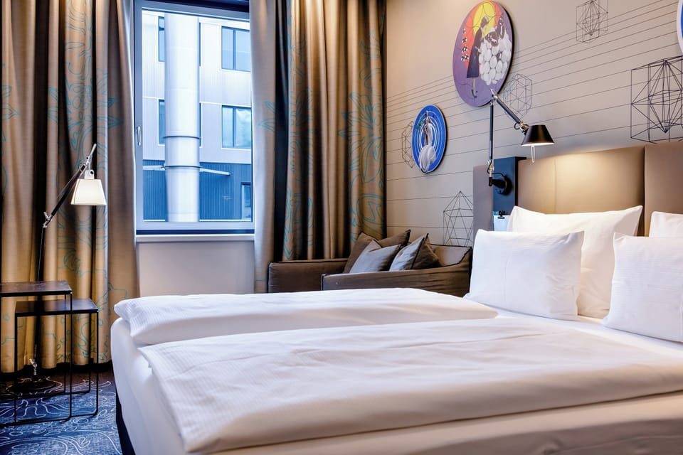 Deluxe Room (2 Adults + 1 Child) | Soundproofing, free WiFi, bed sheets