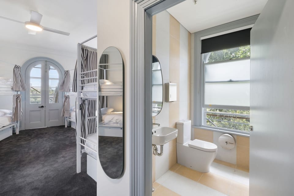 10 Bed Deluxe with ensuite and balcony | Blackout drapes, WiFi (free), bed sheets