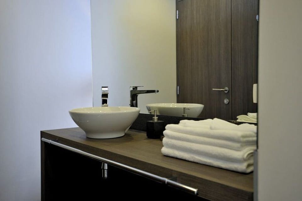Premium bedding, down comforters, in-room safe, desk