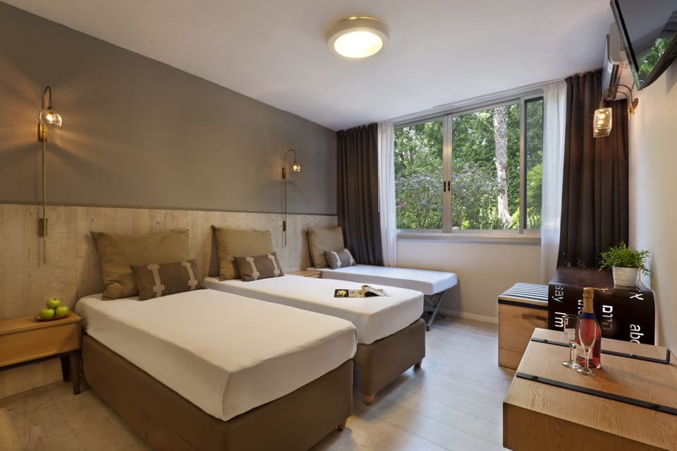 Classic Double or Twin Room, Garden View | Blackout drapes, iron/ironing board, free WiFi, bed sheets