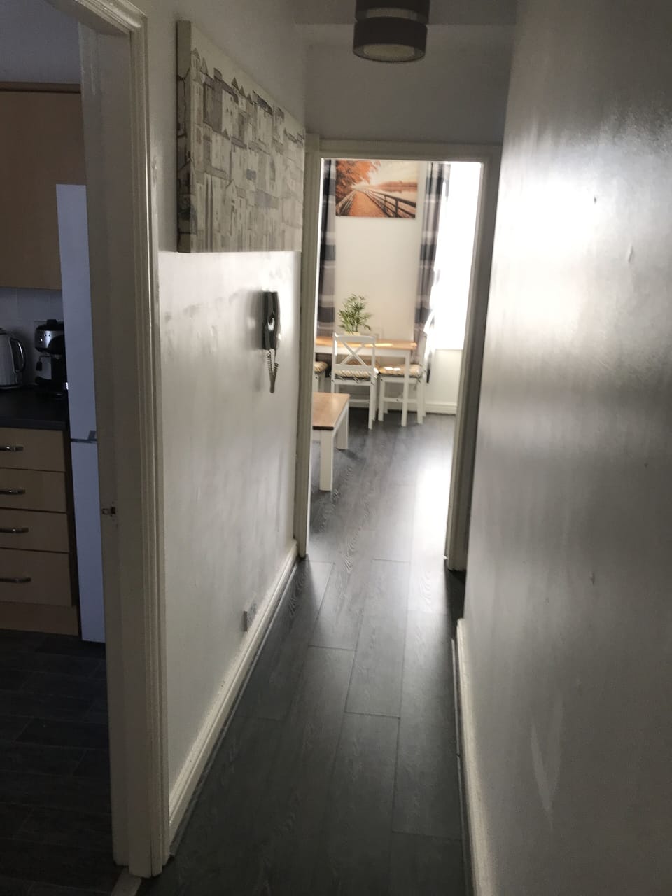 First floor landing leading to kitchen, bathroom and lounge