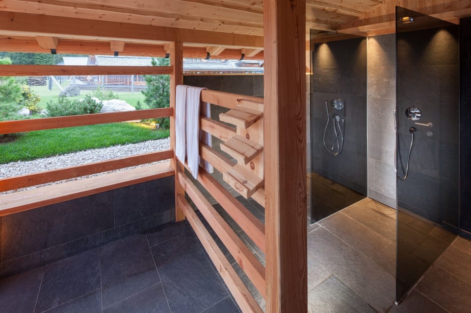 Outdoor treatment areas, sauna, hot tub, steam room, body treatments