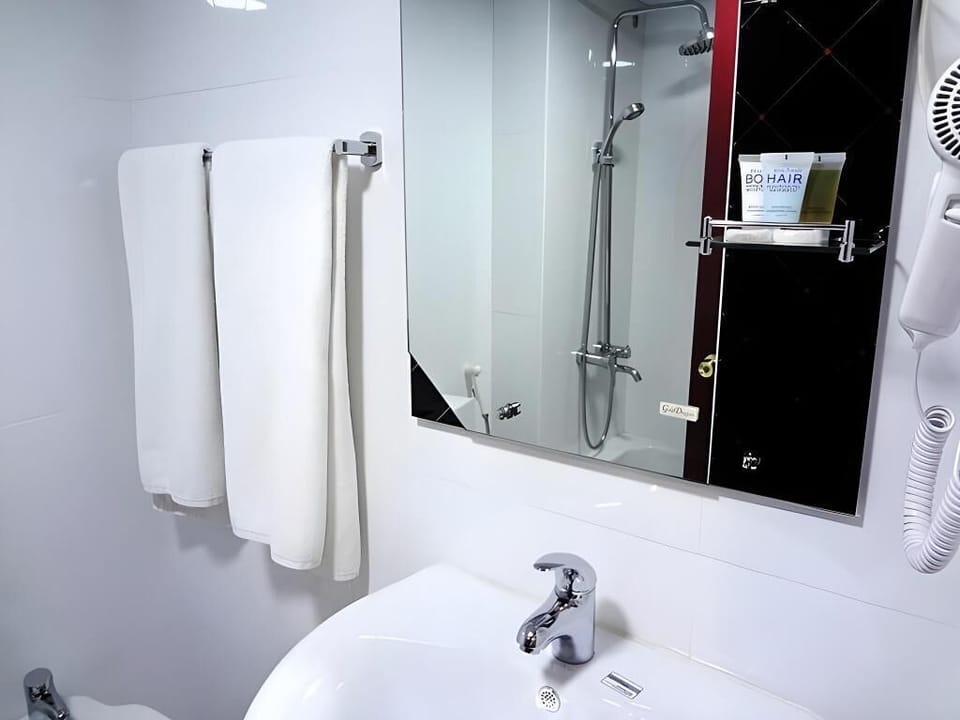 Separate tub and shower, free toiletries, slippers, towels