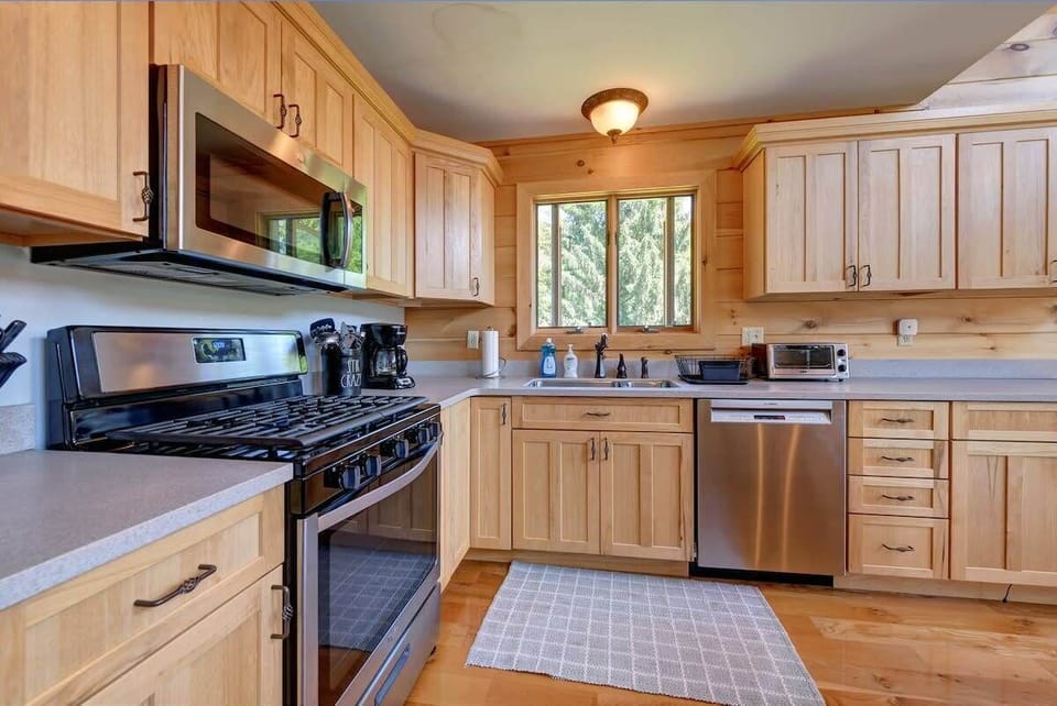 Surprise your family with your own recipe. The kitchen has all new stainless steel refrigerator, gas stove, microwave, dishwasher, cookware, plate and silverware -  everything you need to prepare that delicious meal.