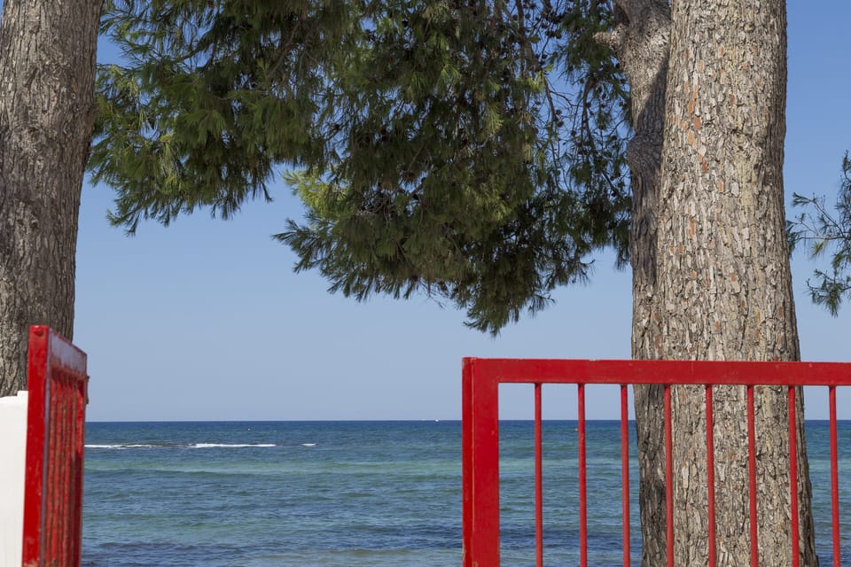 The private small gate to access the beach nearby