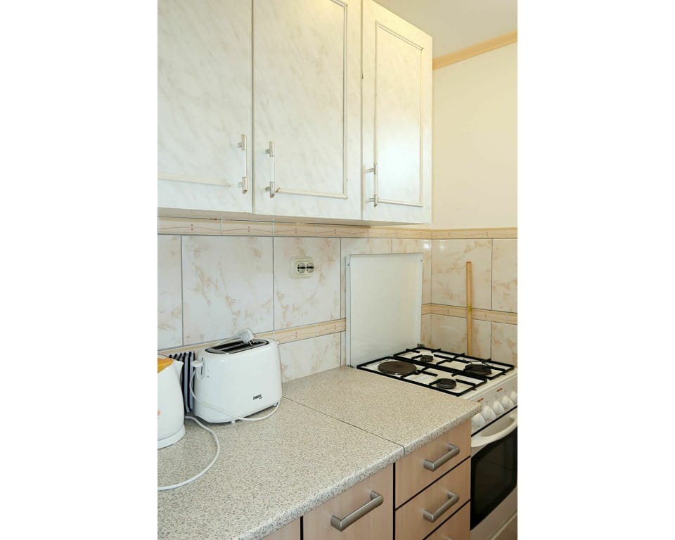 Countertop, Room, Tile, Cabinetry, Property, Kitchen, Furniture, Interior Design, Floor, House
