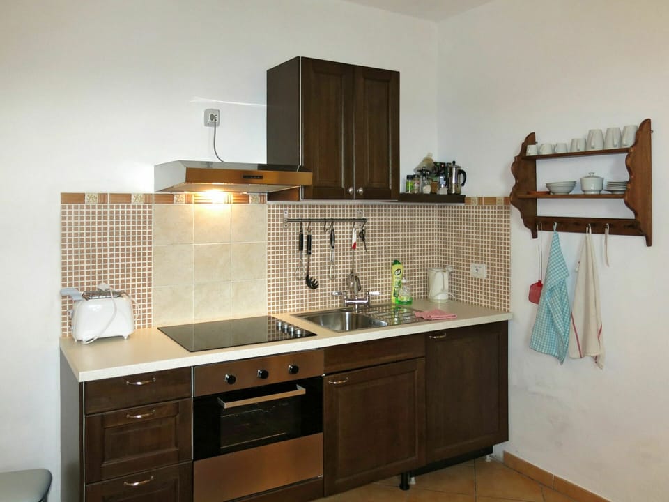 Cabinetry, Countertop, Property, Furniture, Sink, Kitchen, Tap, Kitchen Stove, Wood, Drawer