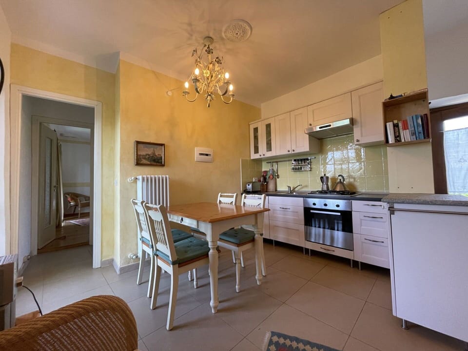 Furniture, Table, Cabinetry, Countertop, Chair, Building, Wood, Kitchen, Interior Design, Floor