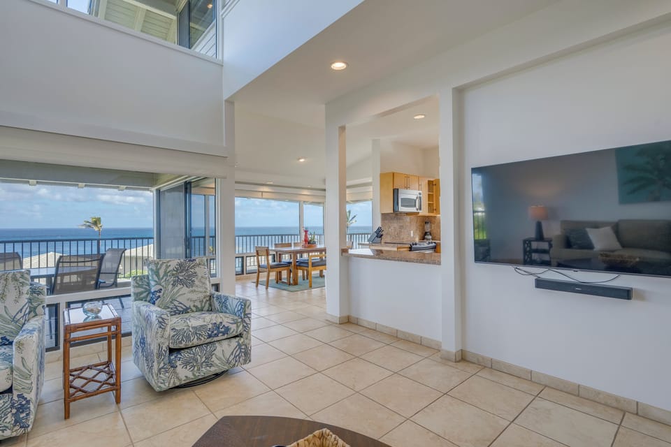 Designed for connection and comfort, this open-concept living space blends coastal elegance with effortless flow.