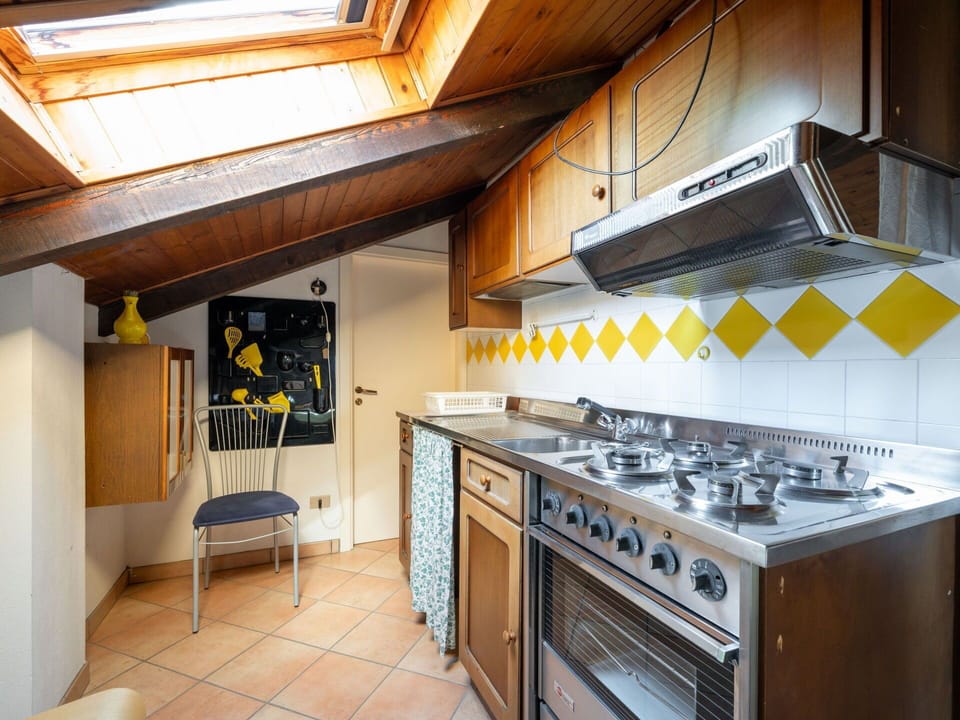 Property, Furniture, Cabinetry, Countertop, Kitchen Appliance, Kitchen Stove, Gas Stove, Wood, Interior Design, Cooktop