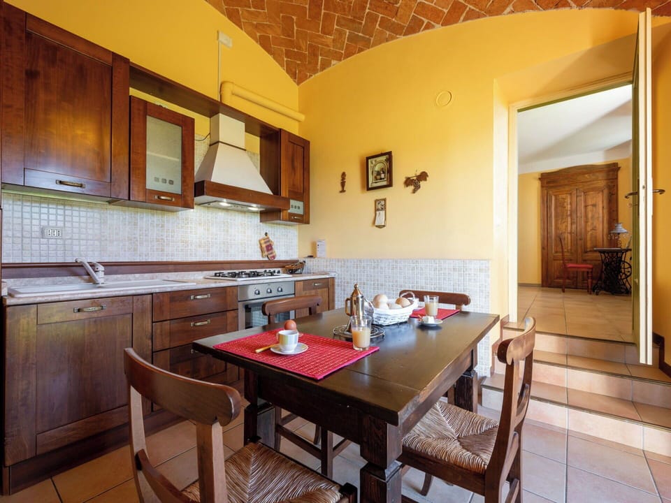 Furniture, Interior Design, Flooring, Floor, Wood, Ceiling, Cabinetry, Kitchen, Room, Table