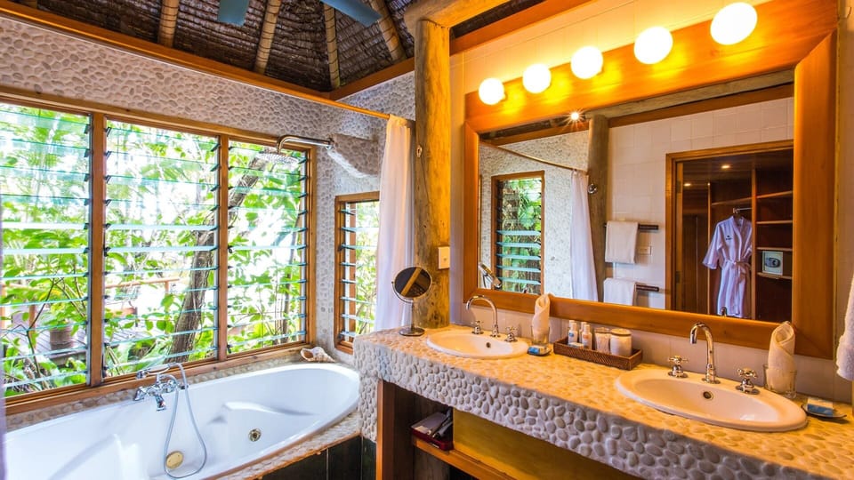 Shower, rainfall showerhead, designer toiletries, hair dryer