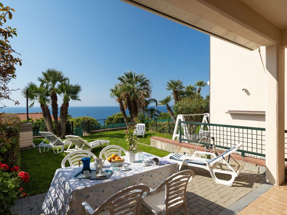 Plant, Sky, Building, Furniture, Water, Seaside Resort, Chair, Table, Interior Design, Shade