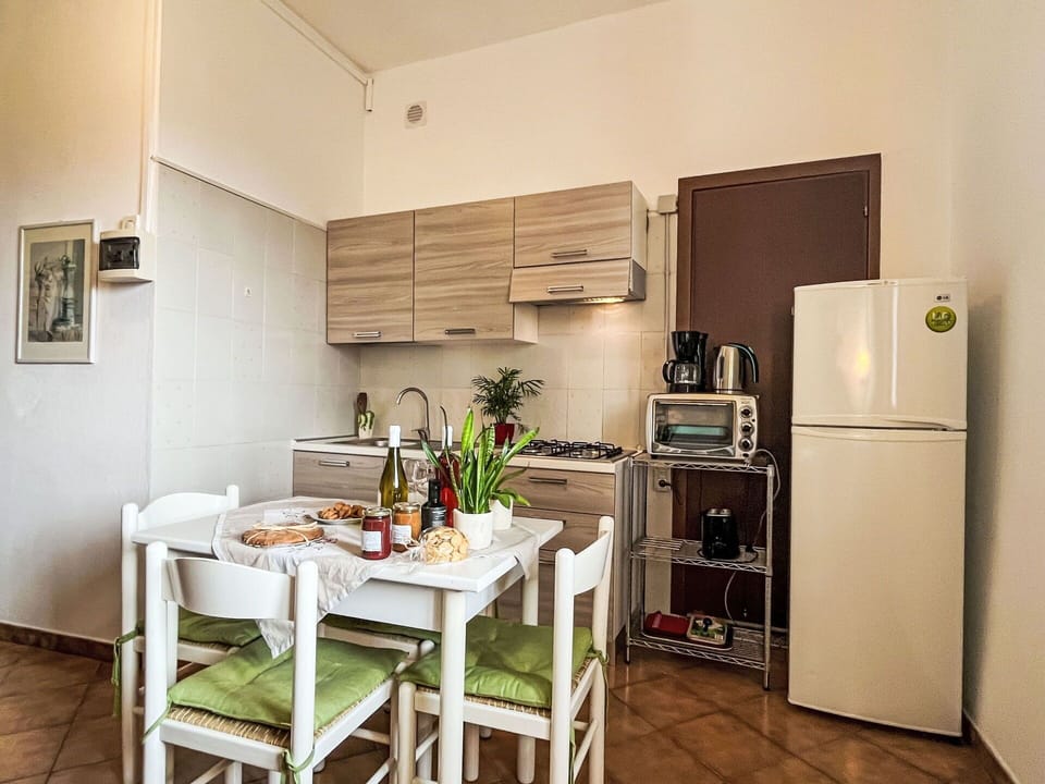 Cabinetry, Property, Furniture, Kitchen Appliance, Countertop, Kitchen Stove, Kitchen, Wood, Interior Design, Home Appliance