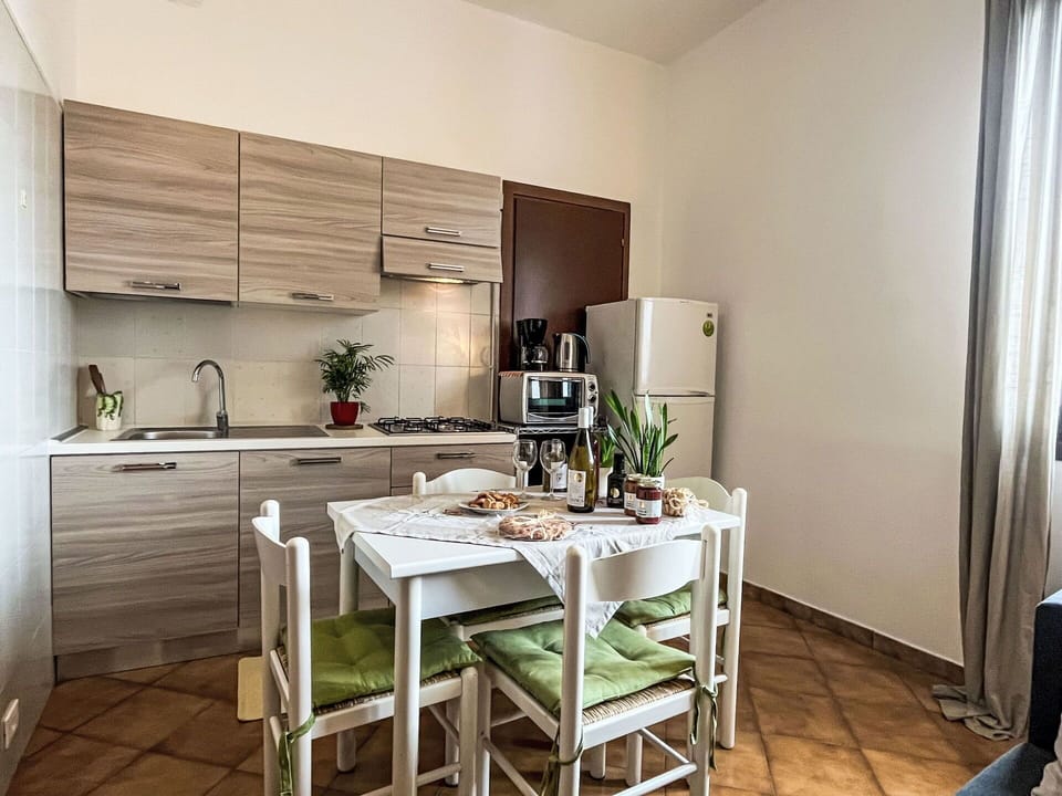 Furniture, Property, Cabinetry, Table, Countertop, Interior Design, Wood, Kitchen Stove, Kitchen Appliance, Floor