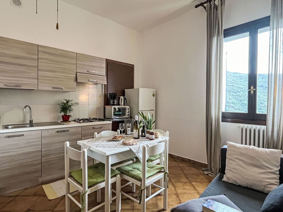 Furniture, Property, Table, Cabinetry, Countertop, Window, Wood, Kitchen Stove, Interior Design, Lighting