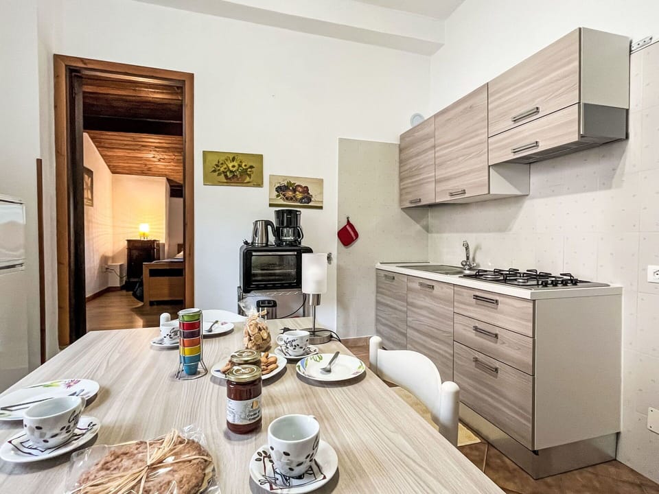 Table, Furniture, Cabinetry, Tableware, Dishware, Food, Kitchen Stove, Picture Frame, Interior Design, Cup