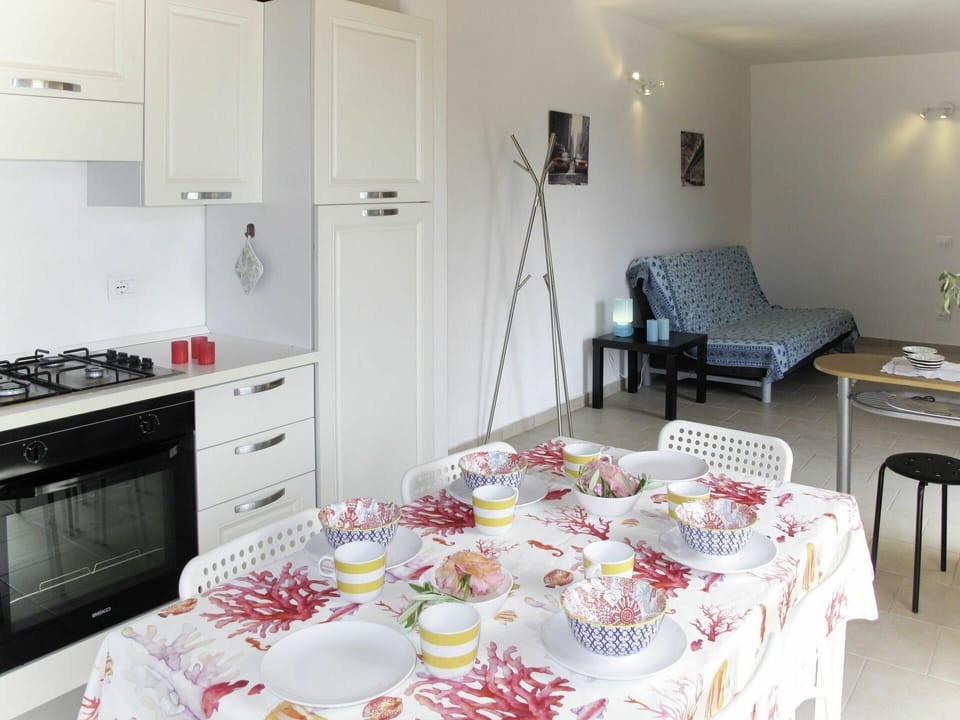 Table, Food, Furniture, Property, Cabinetry, Tableware, Countertop, Tablecloth, Picture Frame, Drawer