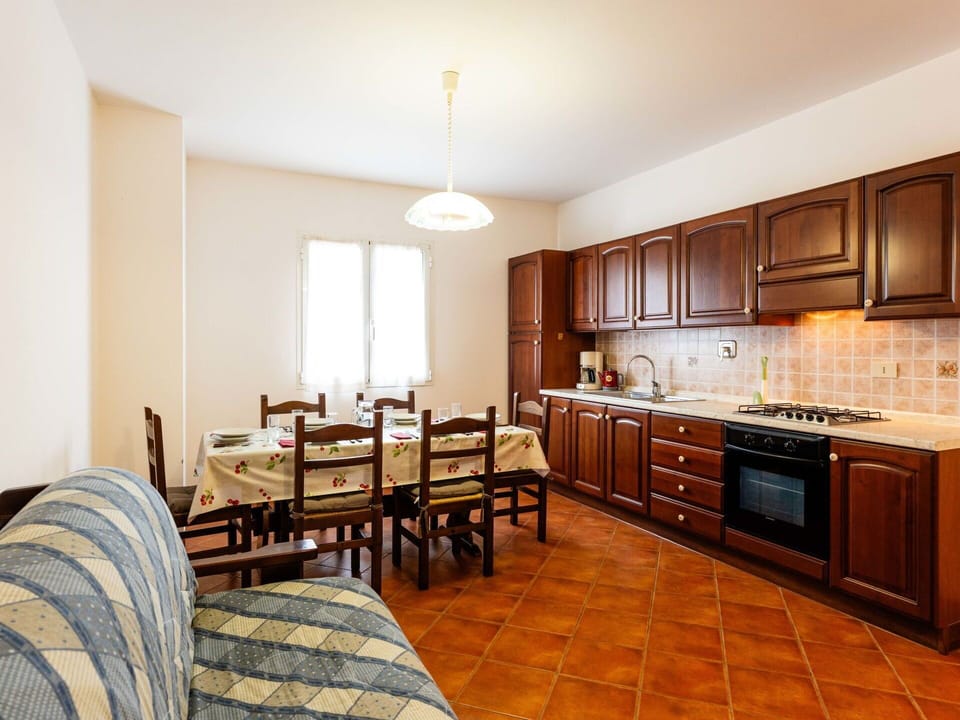 Interior Design, Flooring, Floor, Ceiling, Furniture, Room, Cabinetry, Wood Flooring, Kitchen & Dining Room Table, Wood Stain