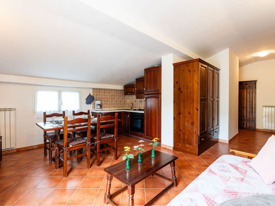 Furniture, Interior Design, Flooring, Ceiling, Wood, Floor, Room, Lighting, Cabinetry, Apartment
