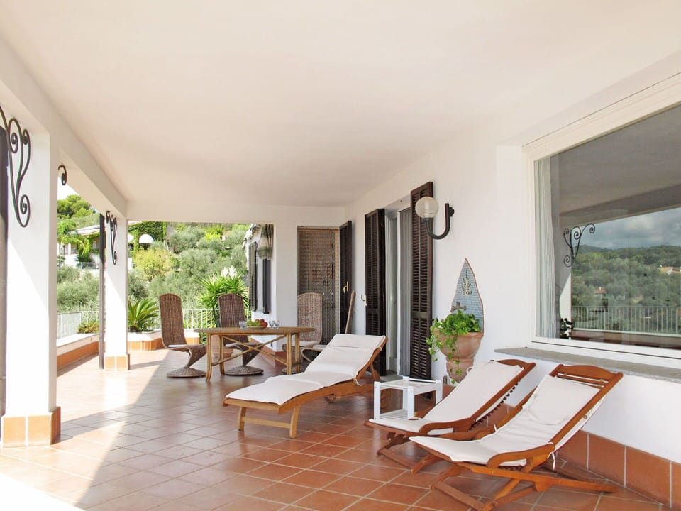 Property, Furniture, Plant, Table, Chair, Wood, Houseplant, Couch, Interior Design, Shade