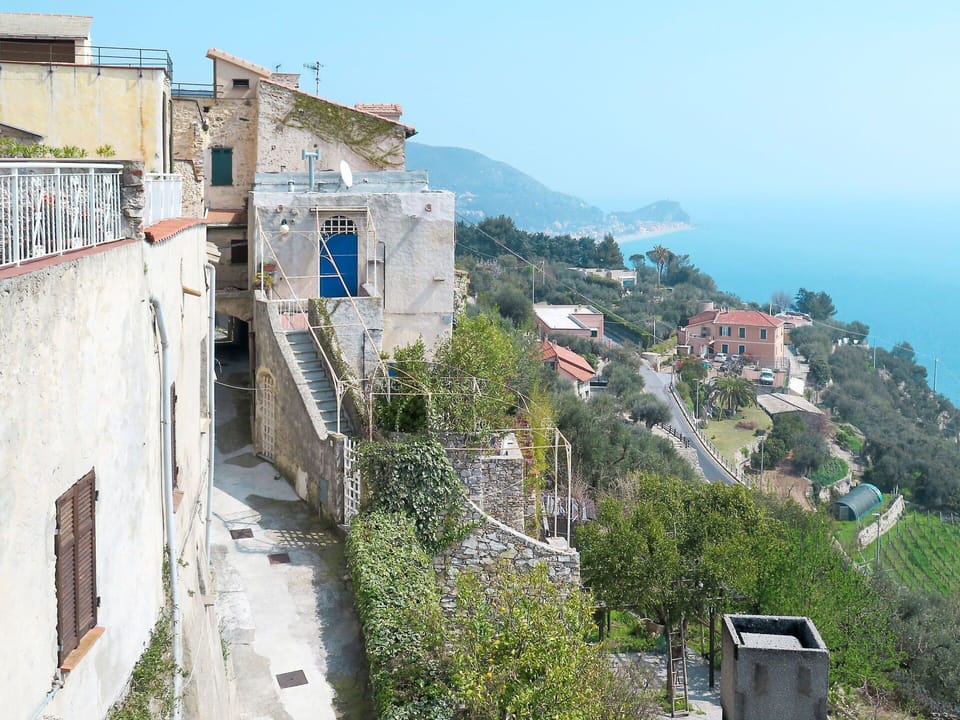 Sky, Water, Building, Azure, Window, Plant, Mountain, Urban Design, House