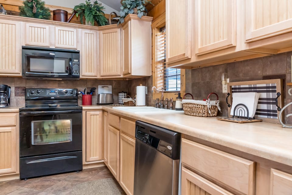 Plenty of utensils, towels & appliances to make your cooking easy just like home