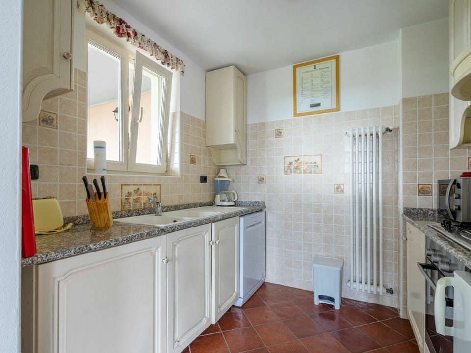 Cabinetry, Countertop, Property, Sink, Building, Kitchen, Wood, Kitchen Stove, Interior Design, Flooring