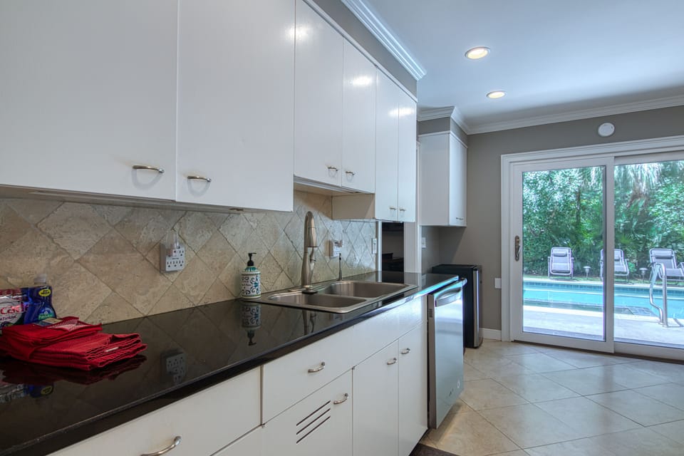 Kitchen with pool just a few steps away.