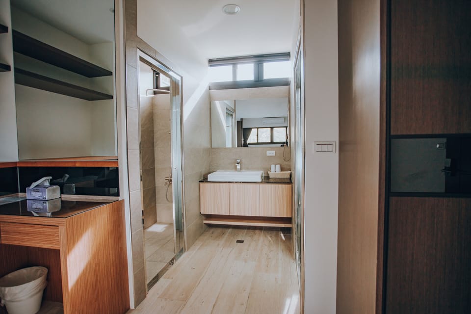 Quadruple Room (A2) | Bathroom | Shower, hair dryer, slippers, towels