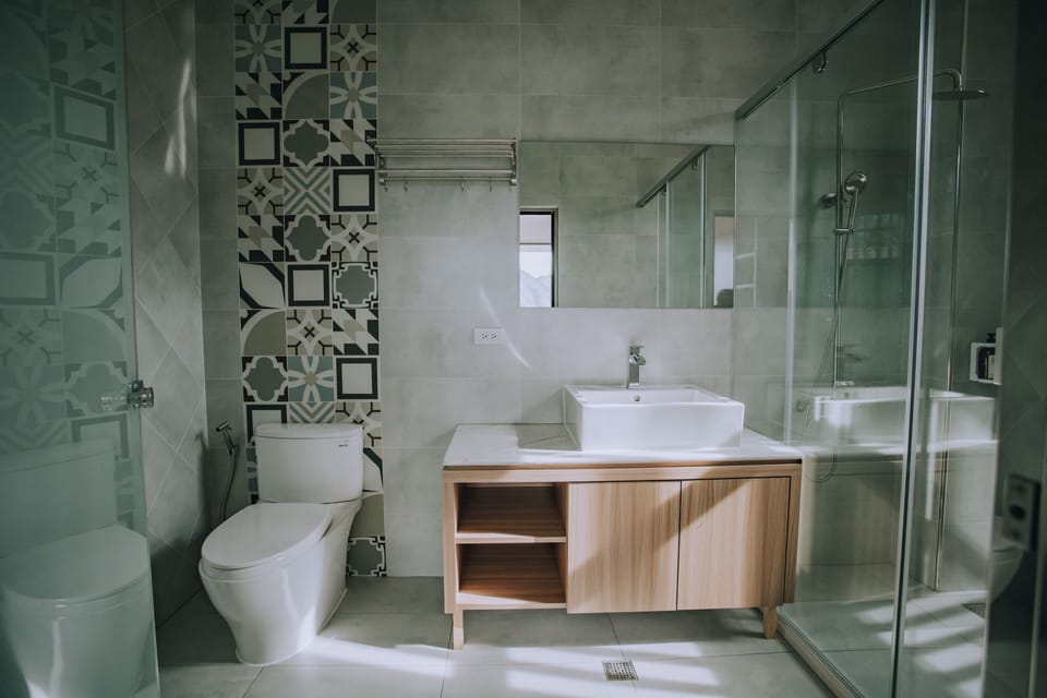 Double Room (B3) | Bathroom | Shower, hair dryer, slippers, towels