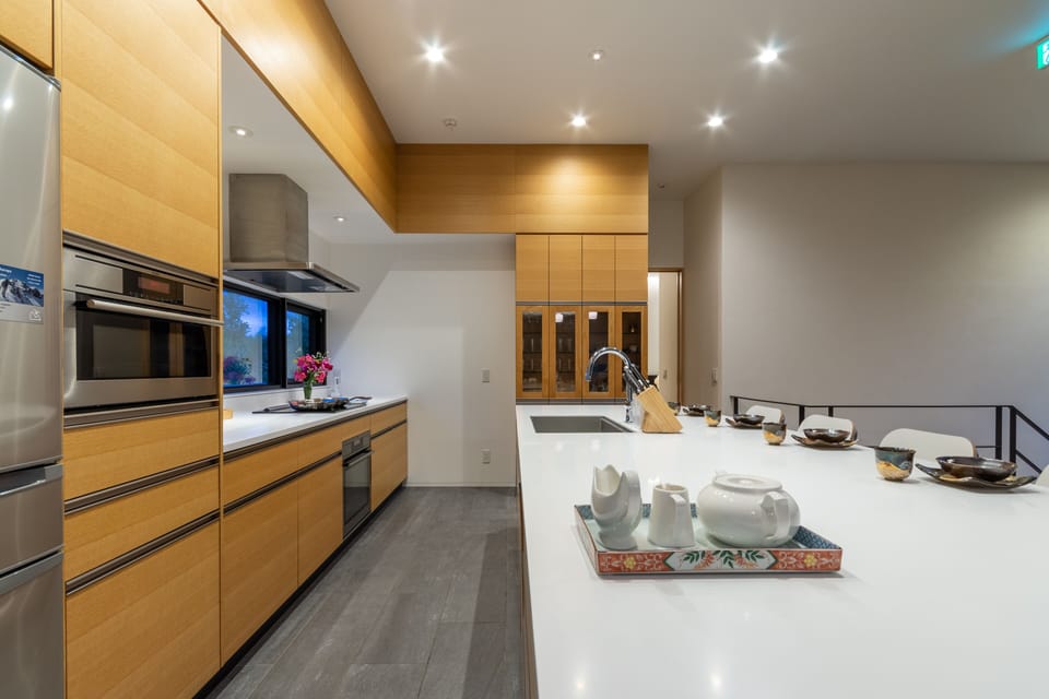 Luxury Chalet, 4 Bedrooms | Private kitchen | Fridge, microwave, stovetop, dishwasher