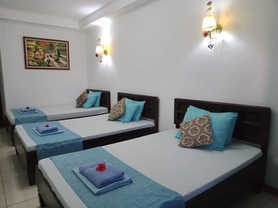 Family Room | Individually decorated, individually furnished, bed sheets