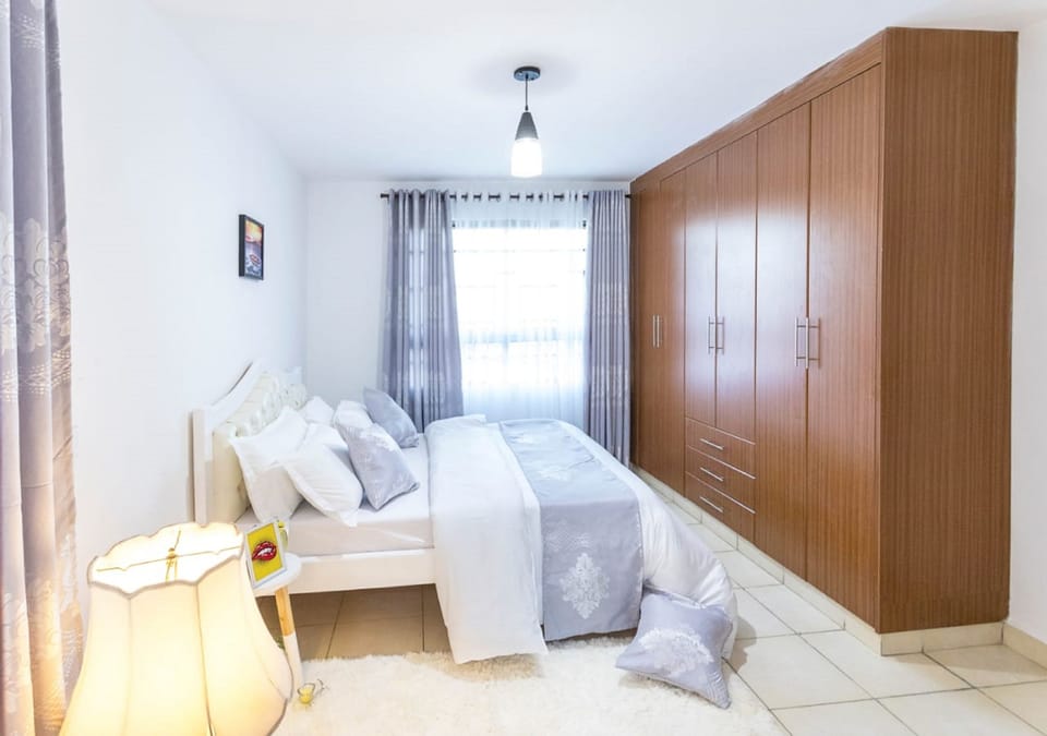 Apartment, 3 Bedrooms | Laptop workspace, blackout drapes, free WiFi, bed sheets