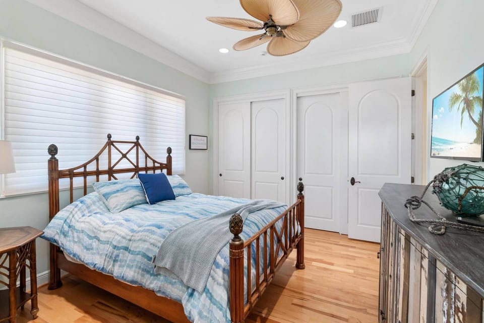 The queen guest suite offers ample closet space, a flat-screen TV and an ensuite bathroom with walk-in shower.