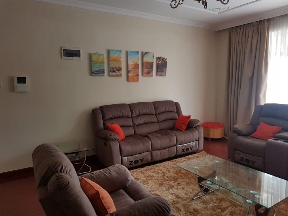 Apartment, 4 Bedrooms | Living area | 32-inch flat-screen TV with satellite channels, TV