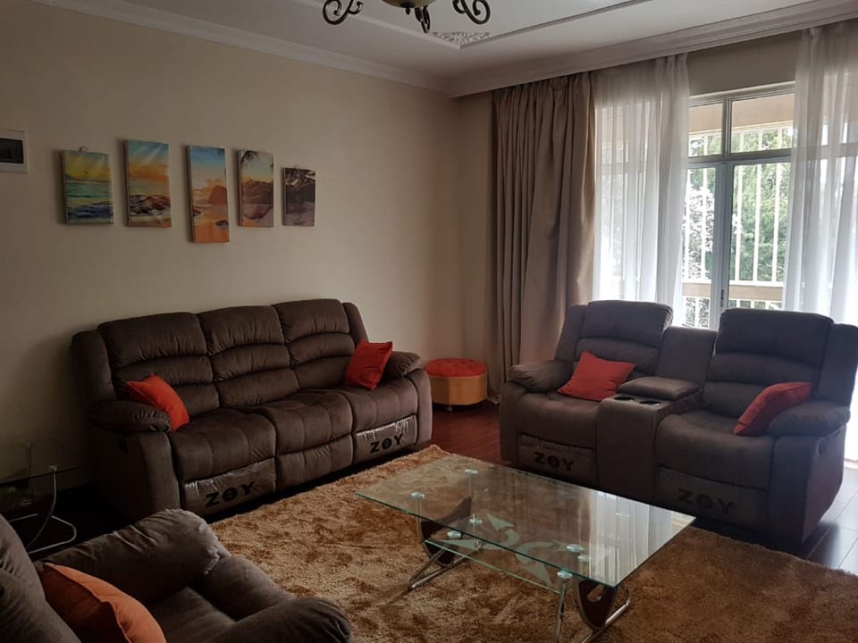 Apartment, 4 Bedrooms | Living area | 32-inch flat-screen TV with satellite channels, TV