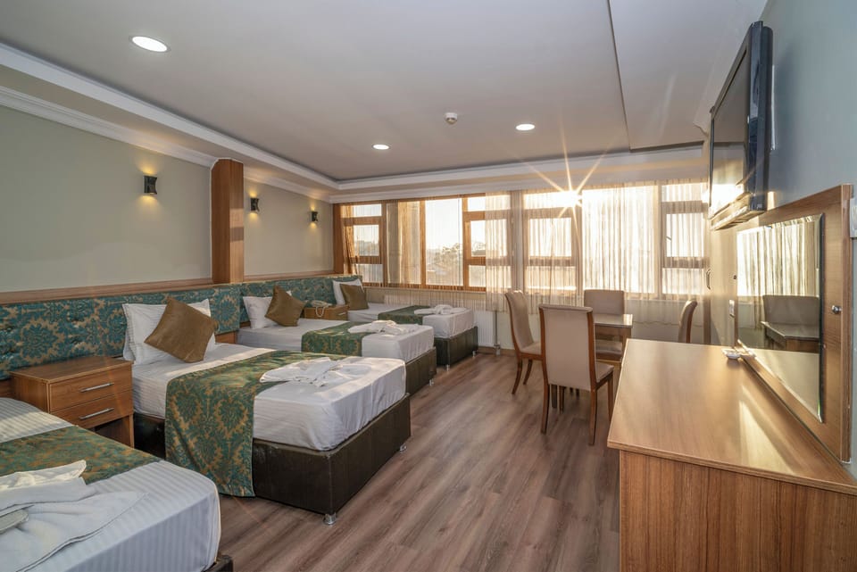 Standard Quadruple Room | In-room safe, soundproofing, iron/ironing board (on request)