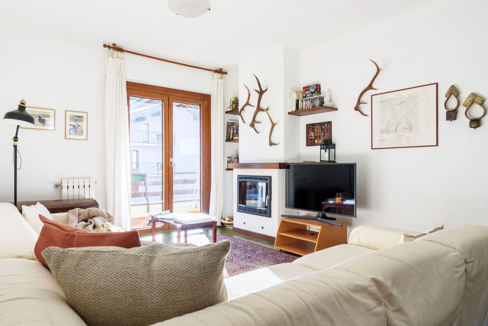 Apartment, 2 Bedrooms | Living area | Flat-screen TV, fireplace