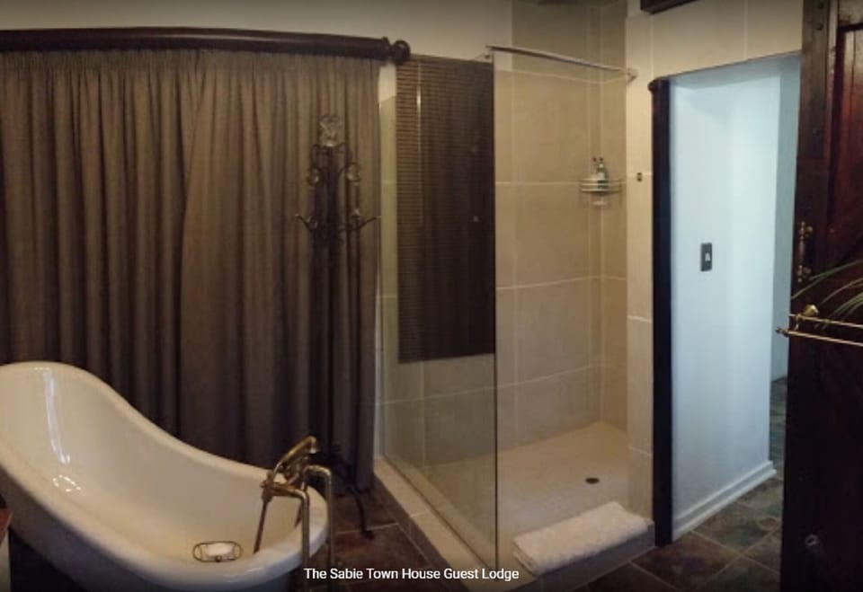 Luxury Suite, Hot Tub, Valley View | Bathroom | Towels, soap, shampoo, toilet paper