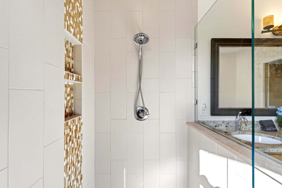Primary en suite bath with a soaking tub and a walk-in shower.